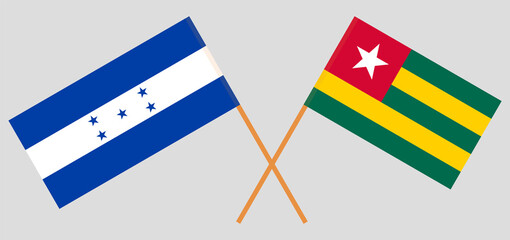 Crossed flags of Honduras and Togo. Official colors. Correct proportion