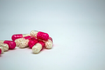 Pills, capsules with the drug on a white background.
