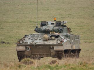 british army FV510 warrior light infantry fighting vehicle tank on maneuvers on Salisbury Plain, Wiltshire