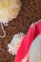 Cute wool dolls are lying on the table