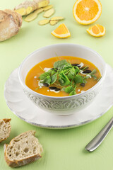 Creamy pumpkin soup with purslane orange fillets series picture 01