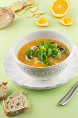 Creamy pumpkin soup with purslane orange fillets series picture 02