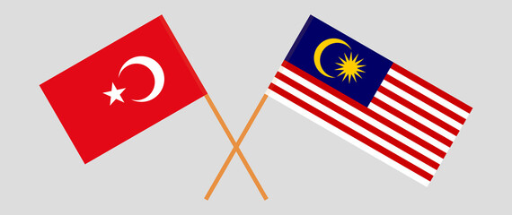 Crossed flags of Turkey and Malaysia. Official colors. Correct proportion