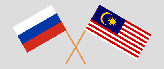 Crossed flags of Russia and Malaysia. Official colors. Correct proportion