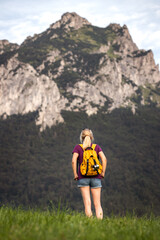 Mountains trekking. Woman hiking in nature. Mountain peak Velky Rozsutec in natural parkland Mala Fatra, Slovakia