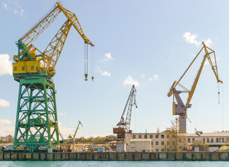 Fototapeta na wymiar Gantry cranes in port