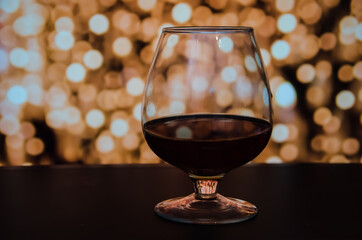 Gala dinner with a glass of red wine, laid table, side view, horizontal
