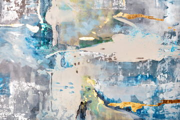Abstract pattern in gray, beige and blue tones with splashes of golden spots.