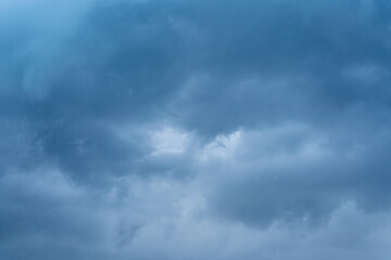Beautiful cloudscape of dark gray storm clouds