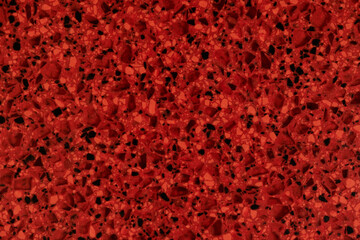 Red pattern of artificial textured stone of tabletop for background. Close up top view. - Powered by Adobe