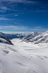 Fototapeta na wymiar a glacier among snow covered mountains