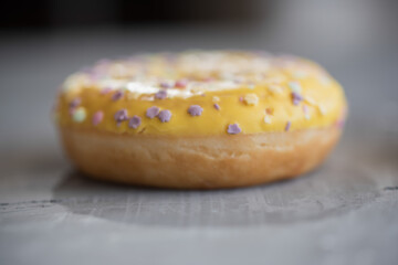 donuts yellow and chocolate Grey background