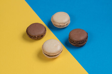 macarons on blue and yellow background