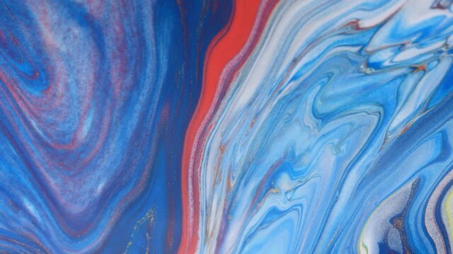 Liquid abstractions. Deep ink spaces. Moving abstract colorful background. Mixing paint colors.