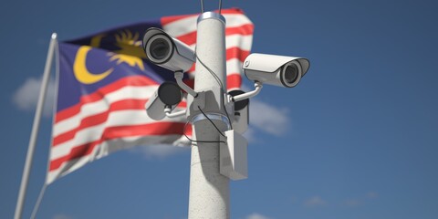 Naklejka na ściany i meble Security cameras near flag of Malaysia, 3d rendering