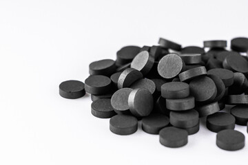 activated carbon on a white acrylic background