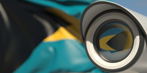 Surveillance camera and flag of Bahamas. National security system concept. 3D rendering