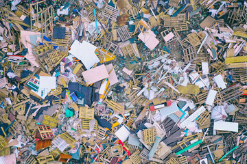 Aerial top drone view of large garbage pile, trash dump, landfill, waste from household dumping site, garbage background. Consumerism and contamination concept