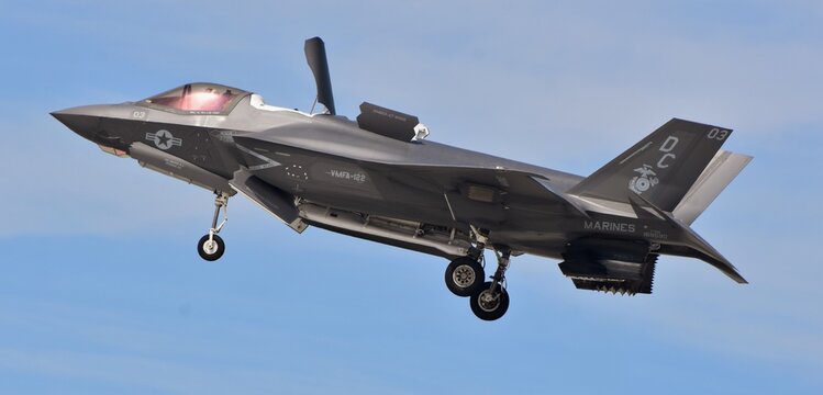 A Marine Corps F-35B Joint Strike Fighter (Lightning II) stealth jet in hover mode