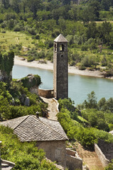 Fototapeta na wymiar Clock tower in Pocitelj. Bosnia and Herzegovina