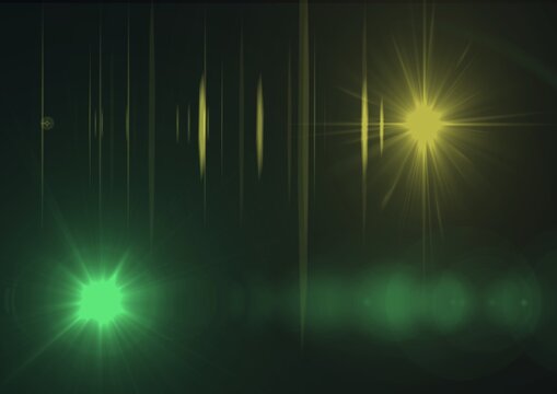 Glowing green and yellow spots of light with light trails in background