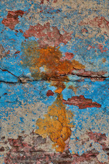 Old wooden fishing boat out of water, detail of paint. Crescent City, California.