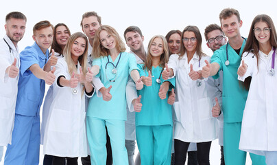 successful group of young doctors showing thumbs up