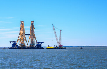 Obraz premium Cutting Cranes and Salvage Barge