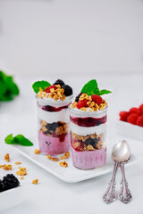 Berry pudding with fresh berries, granola and greek yogurt.