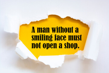 Motivational quote. A man without a smiling face must not open a shop.