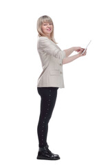 attractive blonde woman using her digital tablet .