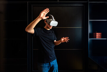 Fototapeta na wymiar Gamer Man Wearing Virtual Reality Goggles