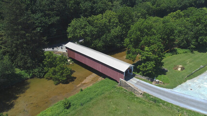 Aerial View of a Covered Bridge in the Pennsylvania Countryside on a Sunny Day
