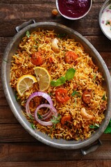 Homemade Prawn Shrimp biryani served with Yogurt Raita and beet pickle