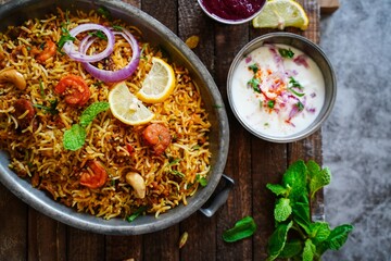 Homemade Prawn Shrimp biryani served with Yogurt Raita and beet pickle