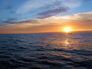 Sun rises over Alegranza island, Canary Islands, Spain.