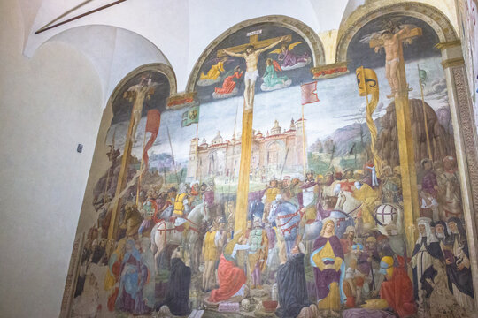 Milan, Italy - November 15, 2016: The Crucifixion mural painting of Giovanni Donato Montorfano in the Refectory of Santa Maria Delle Grazie Italian church.