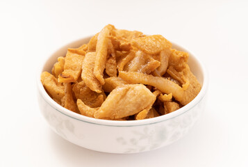 Fresh fried pork dregs on a pure white background