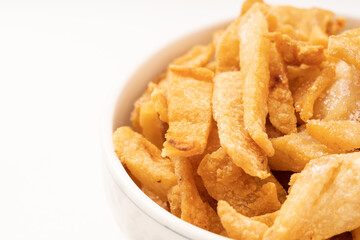 Fresh fried pork dregs on a pure white background