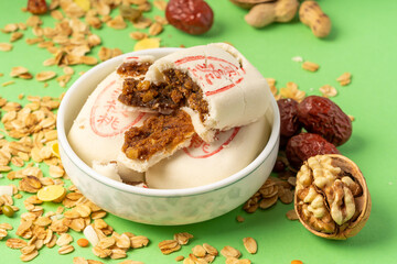 Jujube paste walnut cake with solid color background