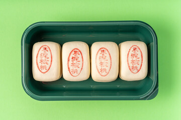 Jujube paste walnut cake with solid color background