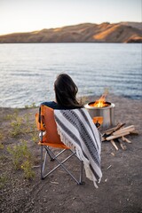 Girl next to the firepit