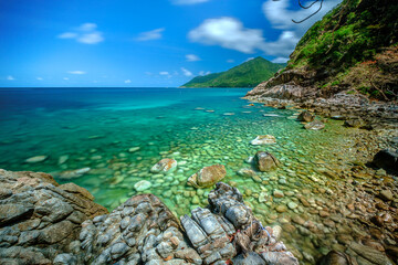 long exposure picture ,at Ao Hin Ngam bay rock beach, clear water beach, blue sky on summer , baan Chaloklum ,koh pha ngan ,Suratthani ,south of thailand