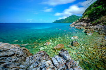 long exposure picture ,at Ao Hin Ngam bay rock beach, clear water beach, blue sky on summer , baan Chaloklum ,koh pha ngan ,Suratthani ,south of thailand