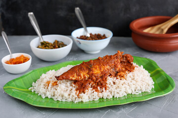 Spicy Mackerel fish curry and rice serving Kerala fish curry , Goan red fish curry , Indian fish curry gravy Bengali fish masala curry Kolkata, India Sri Lanka Lankan food