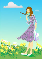 A girl who smells flowers in a blooming spring field and her hair fluttered in the wind