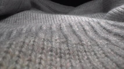 Cozy sheep wool fabric texture in macro. Handcraft knitting woolen sweater. Soft textile abstract background. Winter fashion clothing industry. Home comfort and cosiness - Powered by Adobe