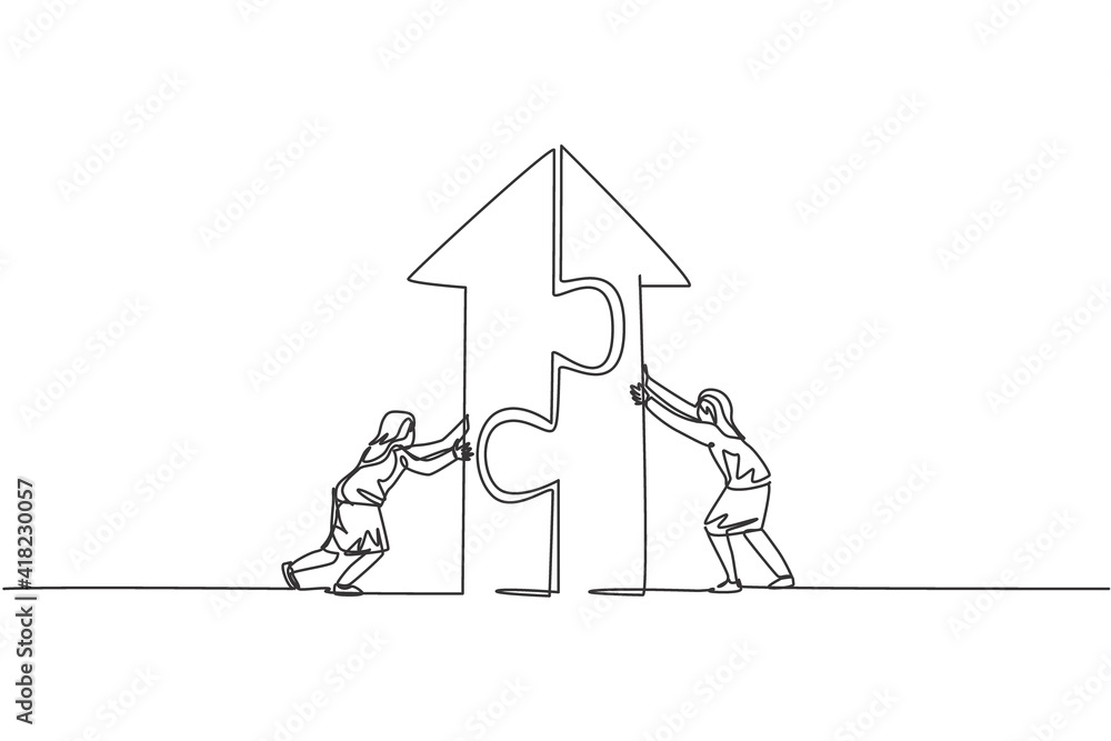 Poster single continuous line drawing two young female managers pushing puzzle to build up arrow building. 