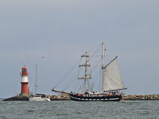 Obraz premium Tradition Vessel In Front Of The East Mole In Warnemuende, Mecklenburg West Pomerania, Germany