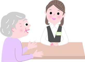 受付に行くシニア女性